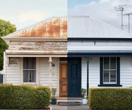 Before and after of a single-storey weatherboard cottage: peeling white paint and a rusted roof on the left, repainted white with navy trim on the right